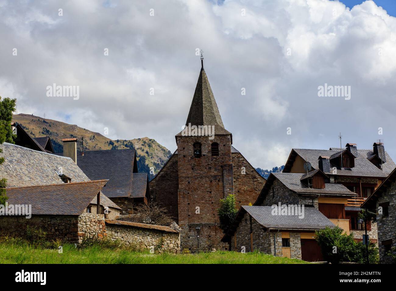 The romanesque church Santa Maria de Cap d`Aran in the village of Tredos. Aran Valley. Catalonia. Spain. Stock Photo
